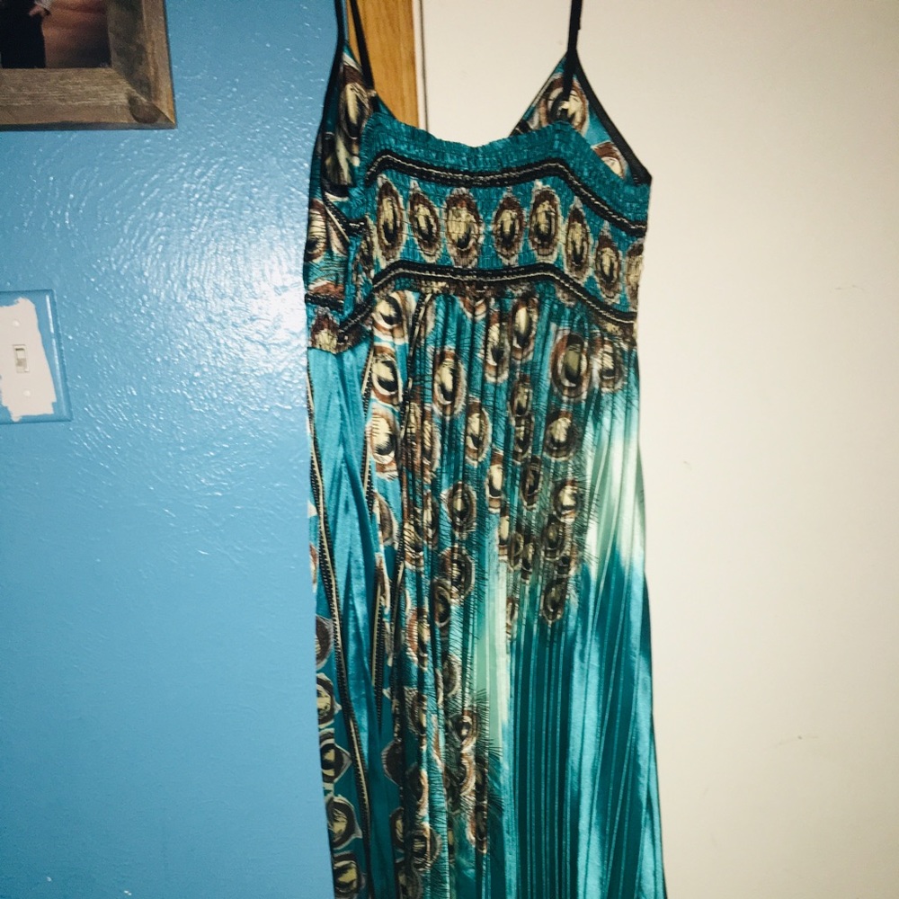 Step in style peacock maxi dress